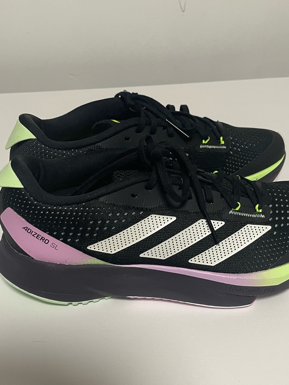 adidas Black Shoe with White Stripes and Lavender & Lime Accents
